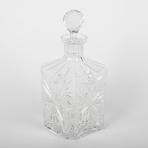 Carafe en cristal taillé avec bouchon facetté