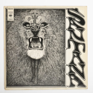 Pochette du vinyle Santana de 1969, dessin en noir et blanc d'une tête de lion et titre en lettres verticales.