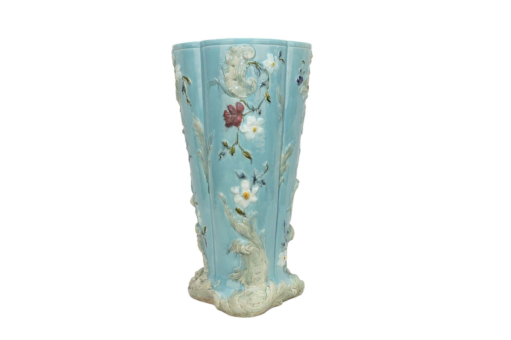 Autre face du porte-parapluie en barbotine bleu turquoise avec fleurs blanches, fleur rouge et feuillages.